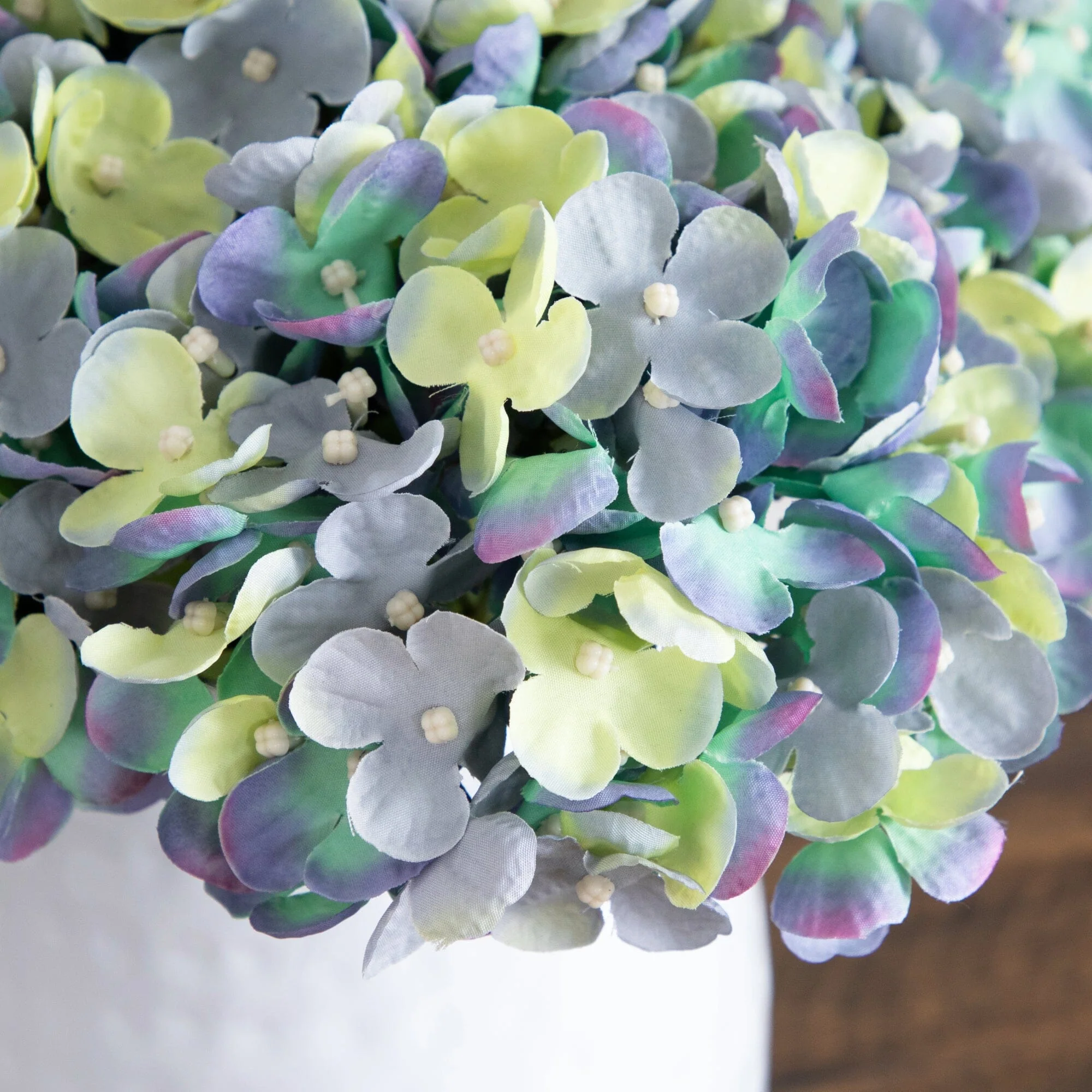 11” Artificial Hydrangea Arrangement in White Metal Vase - Image 2