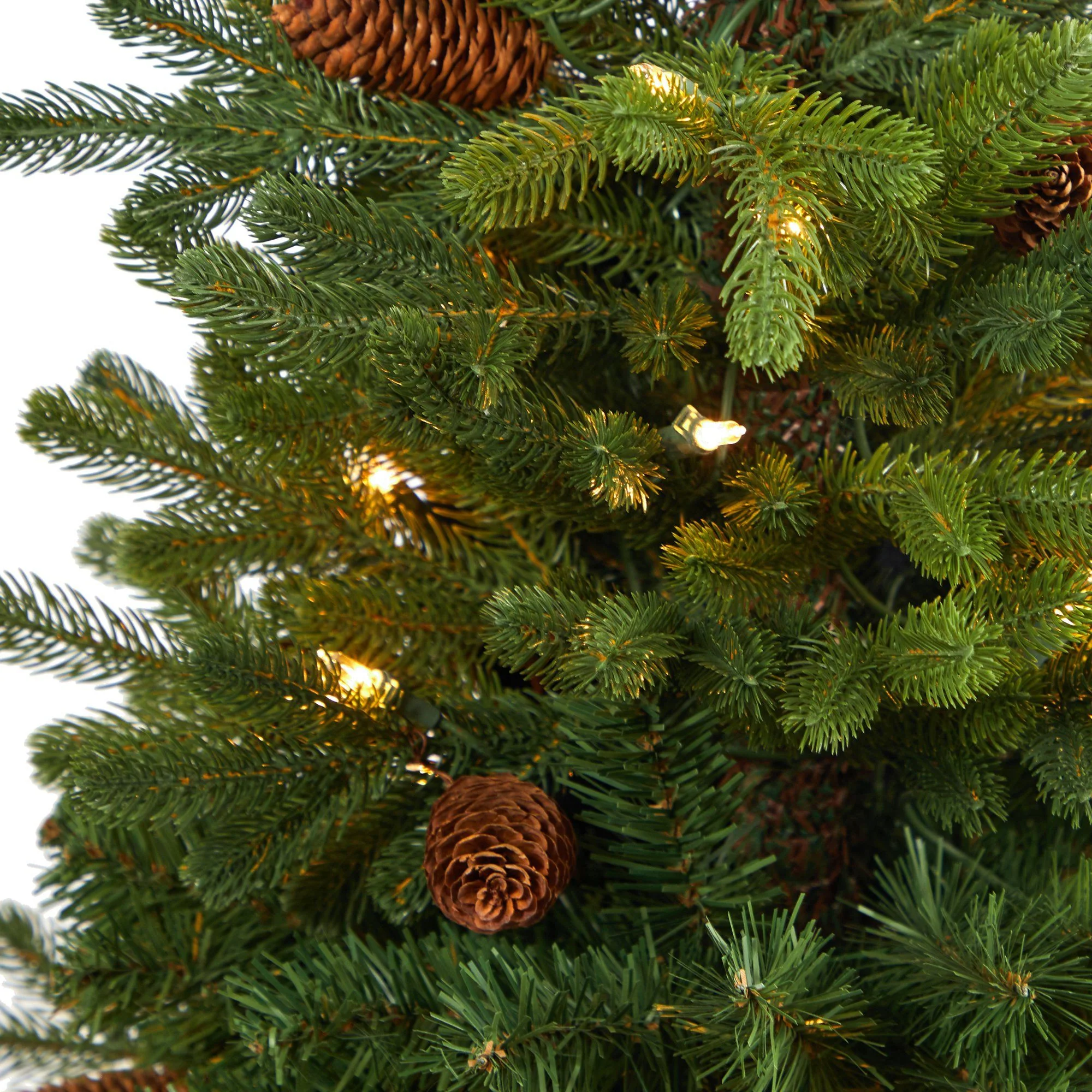 3.5’ Yukon Mountain Fir Artificial Christmas Tree with 50 Clear Lights and Pine Cones in White Planter - Image 4