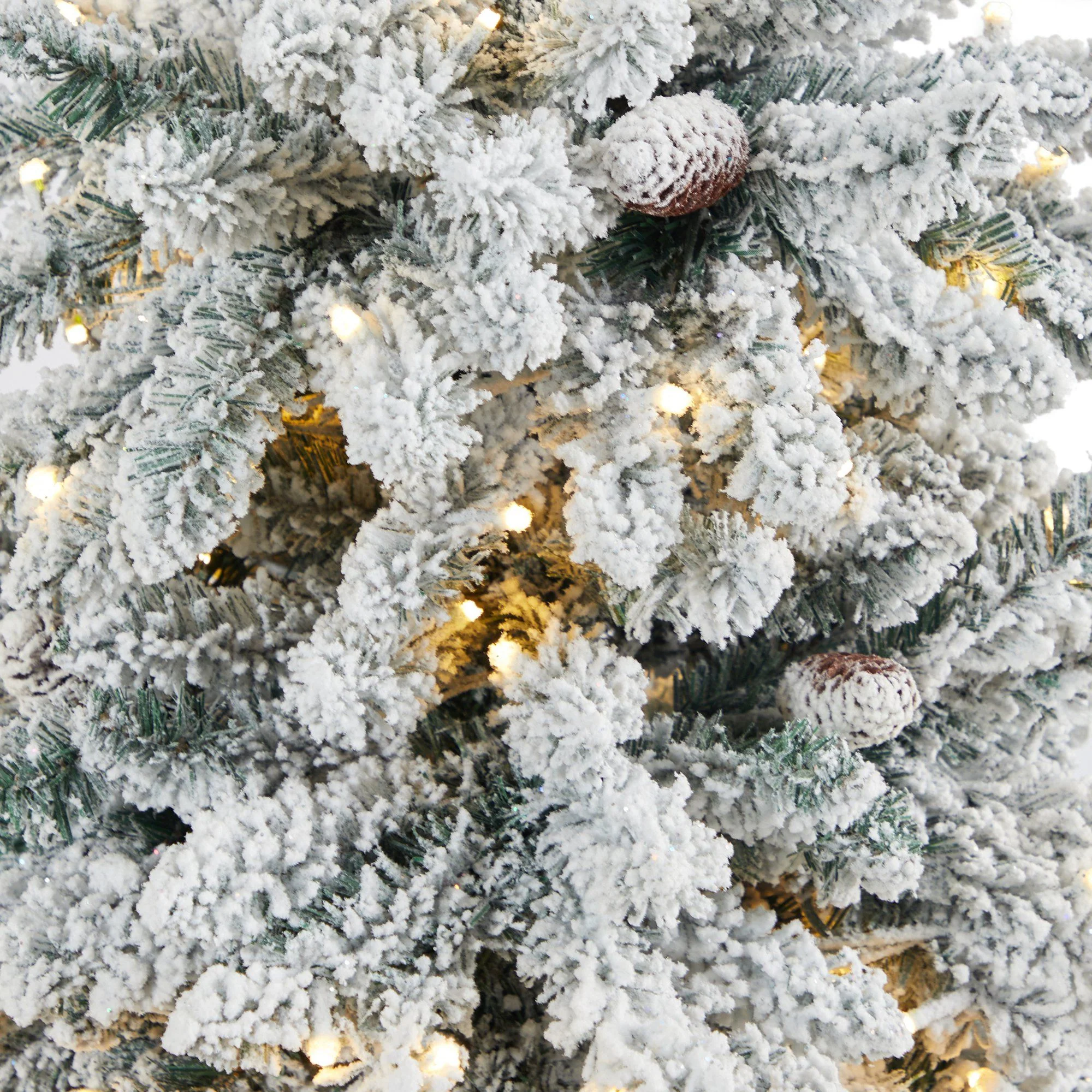 4.5’ Flocked Livingston Fir Artificial Christmas Tree with Pine Cones and 150 Clear Warm LED Lights in Charcoal Urn - Image 4