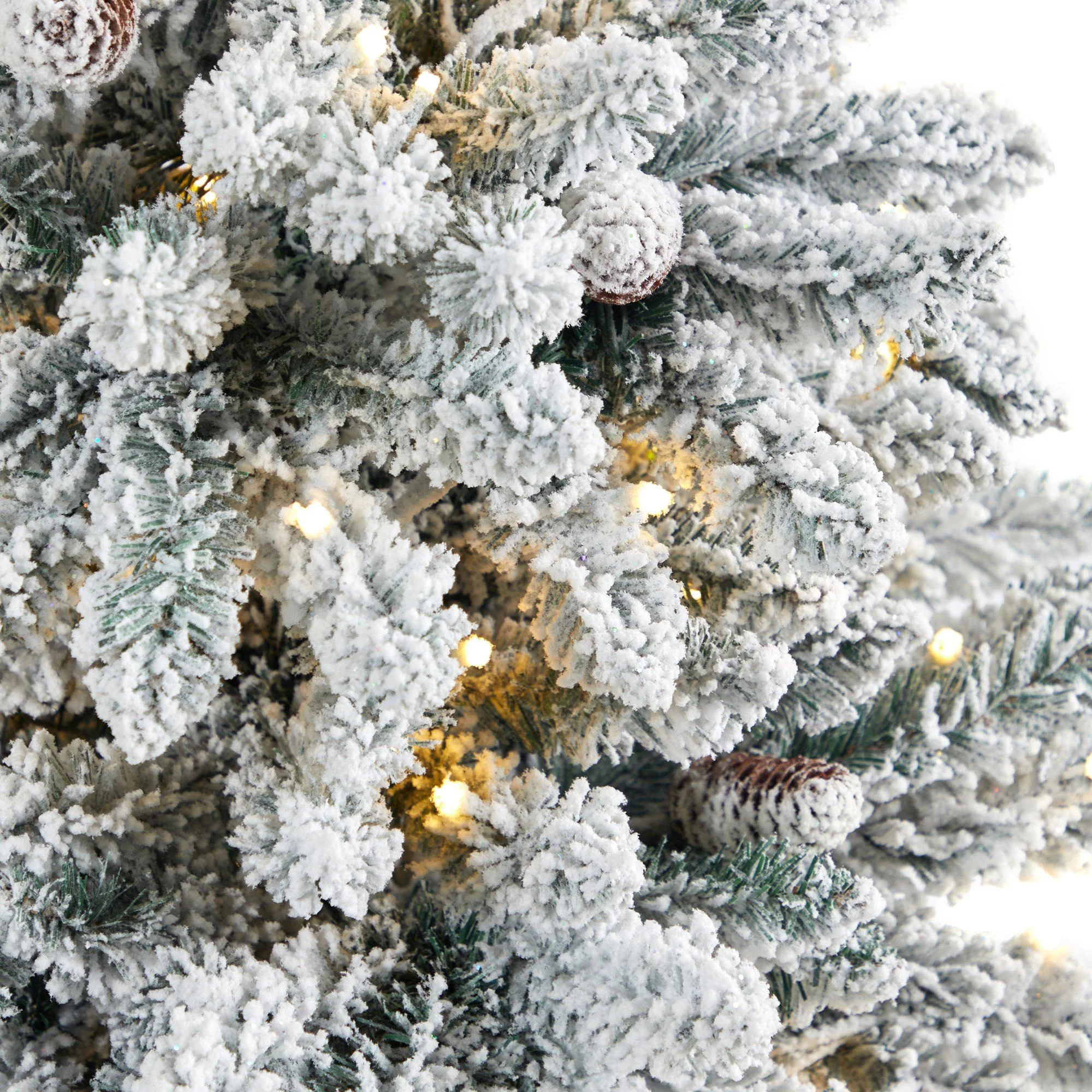 4.5’ Flocked Livingston Fir Artificial Christmas Tree with Pine Cones and 150 Clear Warm LED Lights in Tall White Planter - Image 10