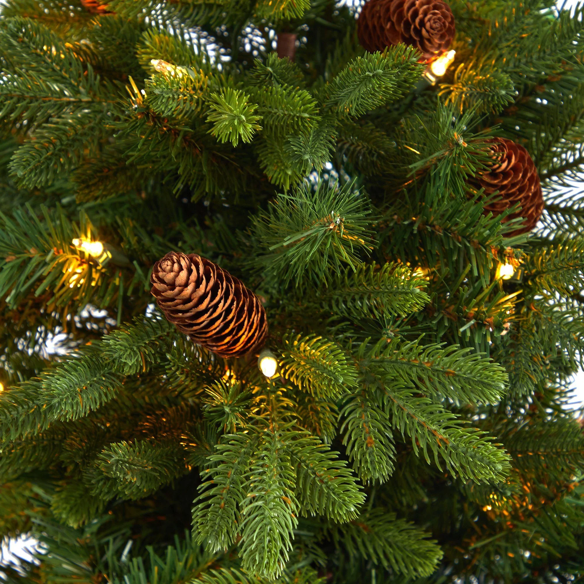 4.5’ Yukon Mountain Fir Artificial Christmas Tree with 100 Clear Lights, Pine Cones and 386 Bendable Branches in Charcoal Planter - Image 4
