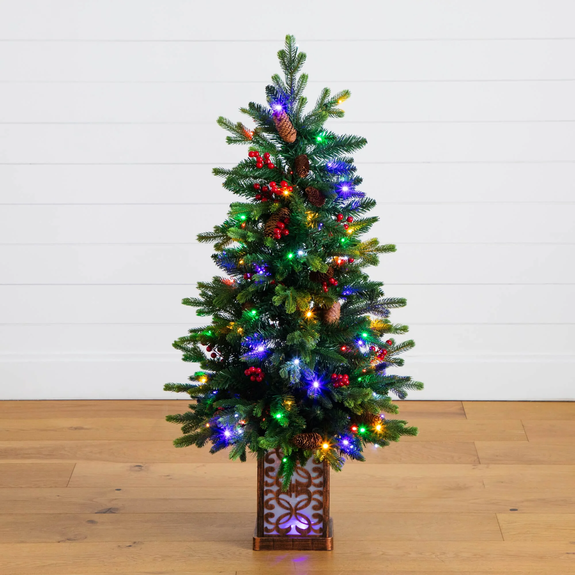 4' Pre-Lit Artificial Christmas Tree with Pinecones, Berries and 100 Multicolored LED Lights in Decorative Planter