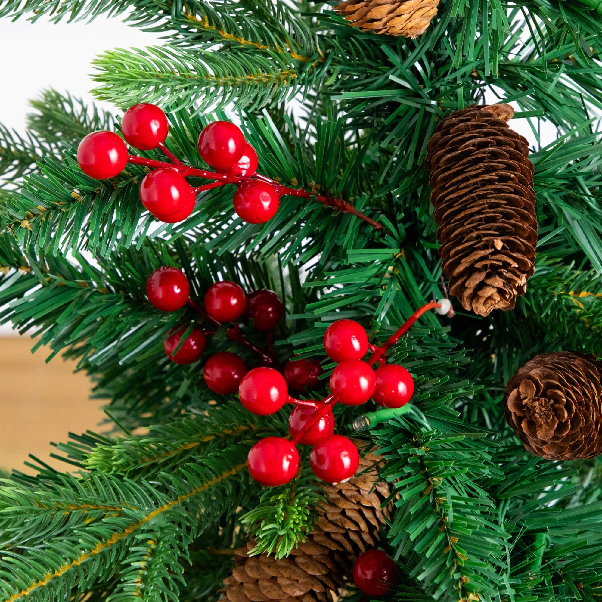 4' Pre-Lit Artificial Christmas Tree with Pinecones, Berries and 100 Multicolored LED Lights in Decorative Planter - Image 4