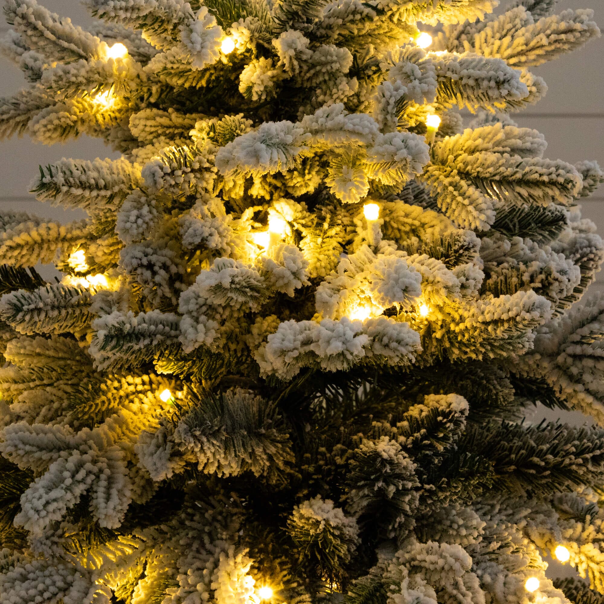 4' Pre-Lit Artificial Flocked Christmas Tree with 100 Warm White LED Lights in Decorative Trunk Planter - Image 3