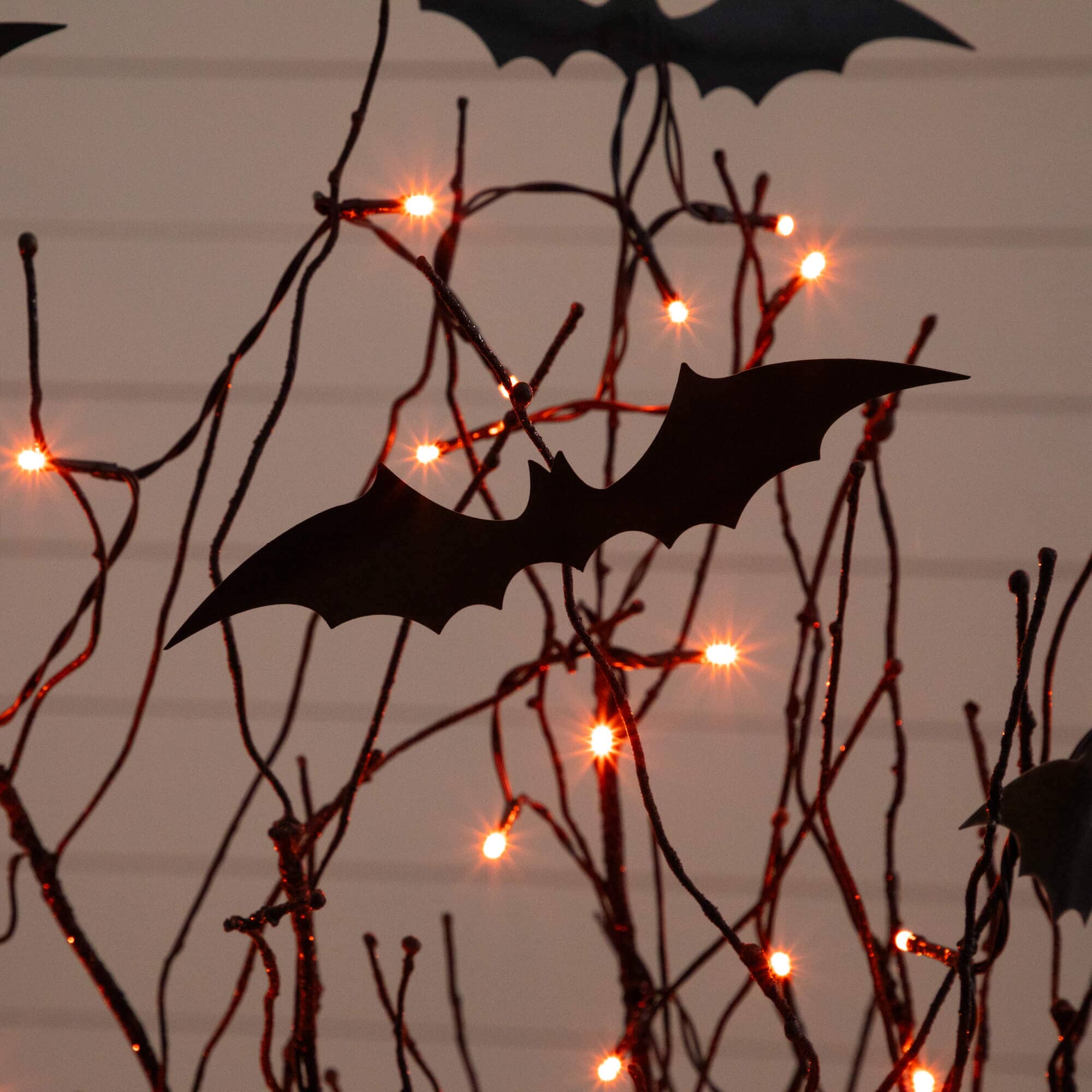 4' Pre-Lit Artificial Halloween Black Twig Tree with Bats and 50 Orange LED Lights - Image 2