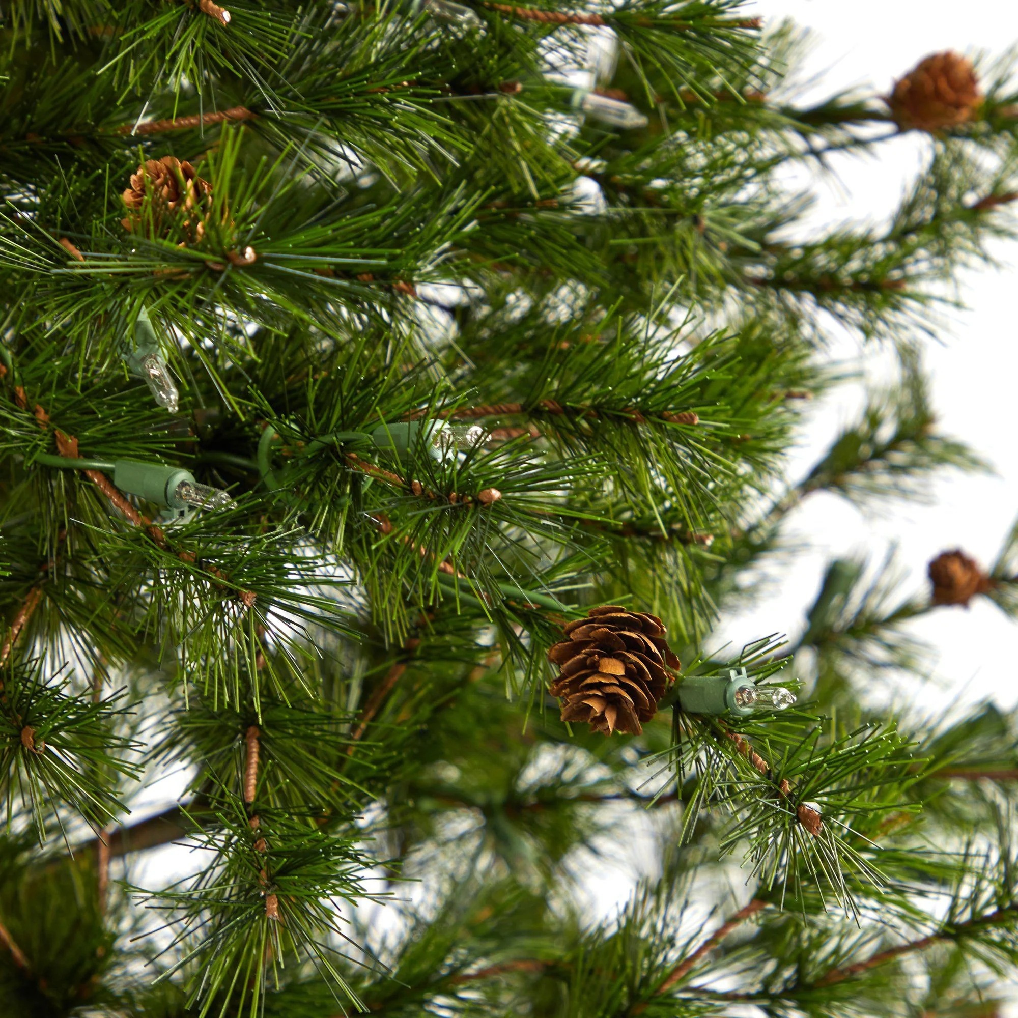 5.5’ Colorado Mountain Pine Artificial Christmas Tree with 250 Clear Lights, 669 Bendable Branches and Pine Cones in Decorative Planter - Image 5