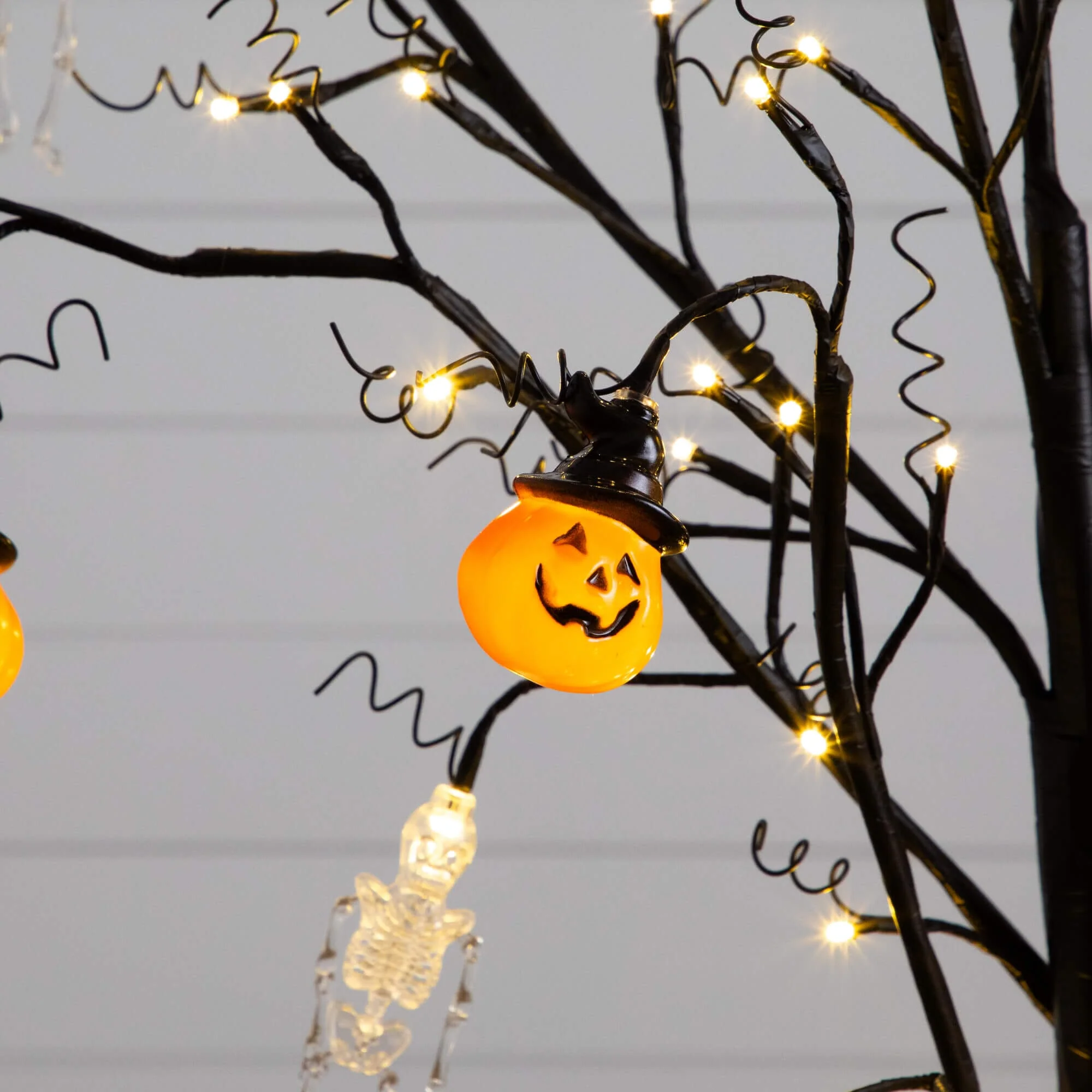 5' Pre-Lit Artificial Halloween Pumpkins and Skulls Ornament Tree with 72 Warm White LED Lights - Image 2