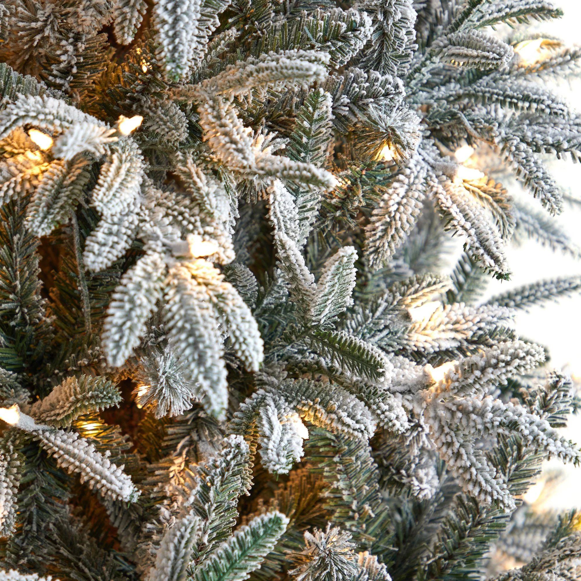 8.5’ Flocked Manchester Spruce Artificial Christmas Tree with 550 Lights and 1317 Bendable Branches - Image 4